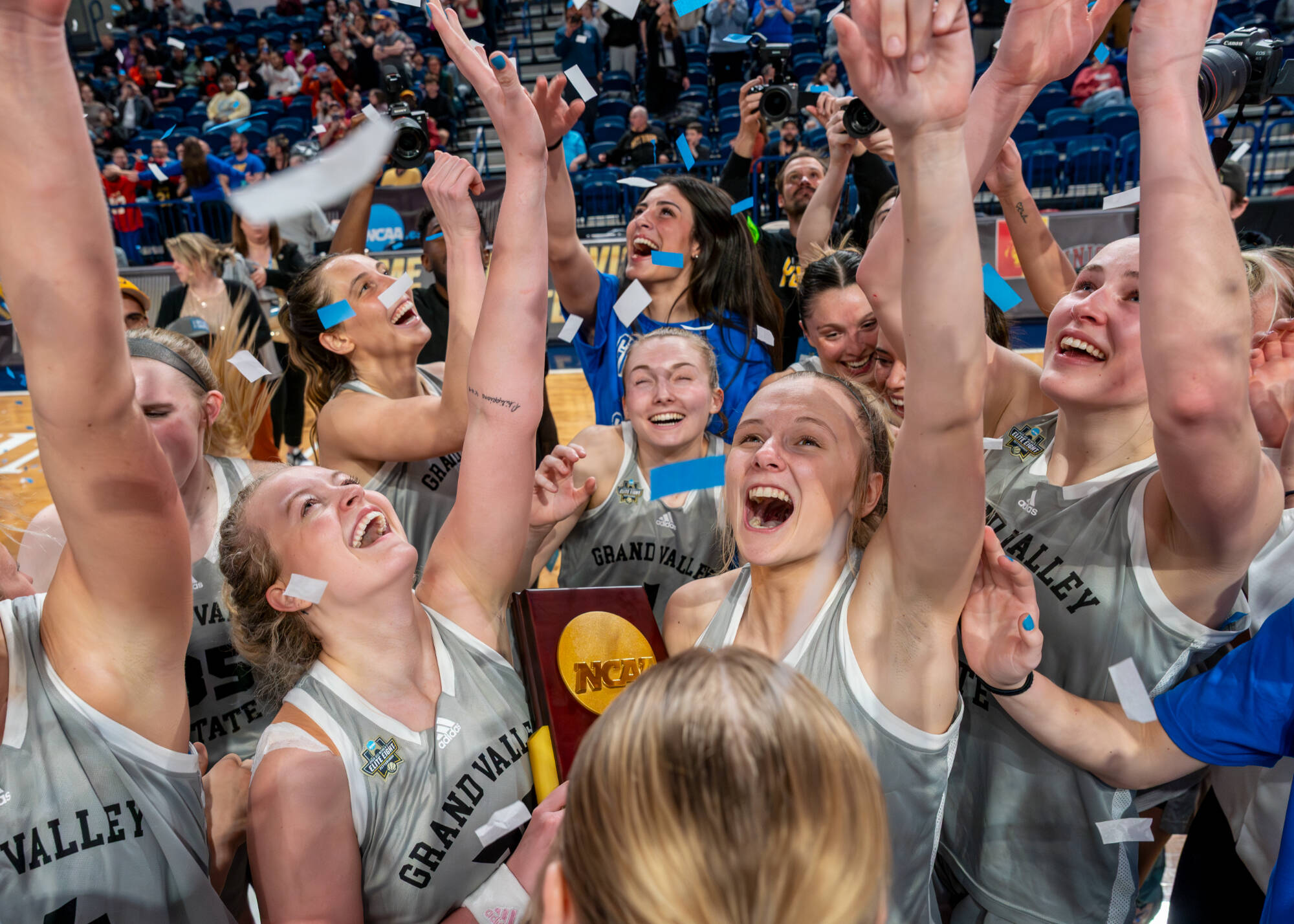 GVSU's Womens Basketball team celebrates after winning the national championship.